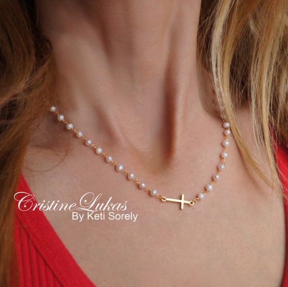 Natural Pearl Necklace With Sideways Cross in Sterling Silver