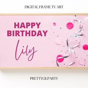 May include: A digital frame TV art print with a pink background, featuring the text "HAPPY BIRTHDAY Lily" in magenta. Silver streamers and pink confetti decorate the image. The frame is light brown.