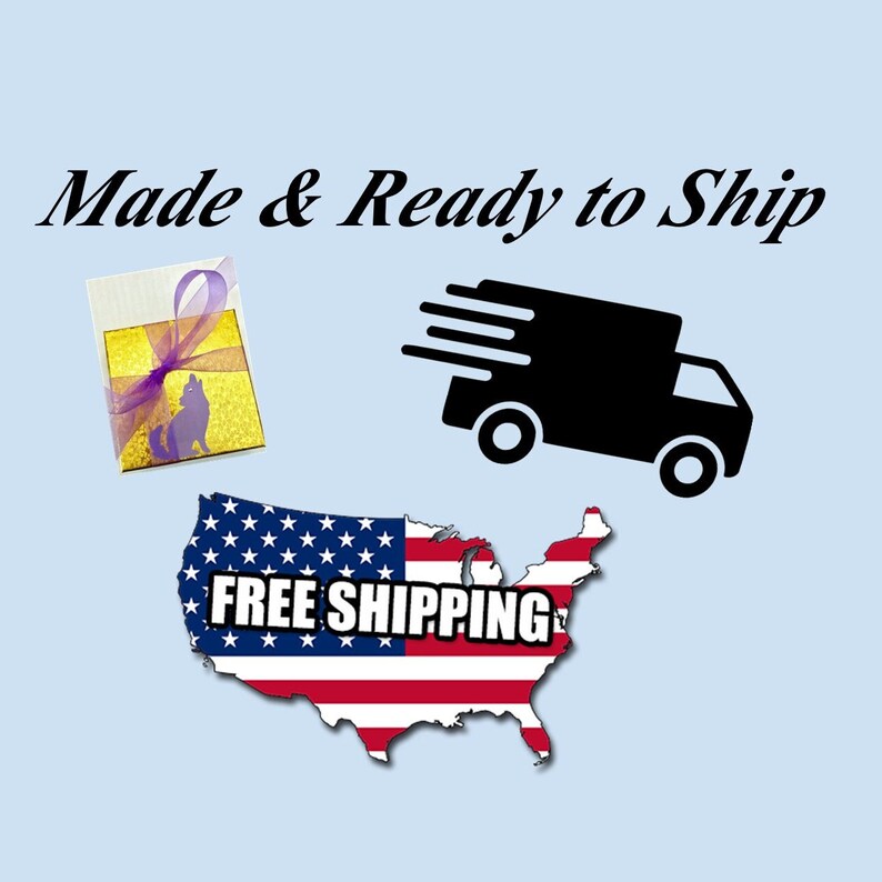 May include: A gold gift box with a purple ribbon and a silhouette of a dog inside. The box is sitting on a white background with the text "Made & Ready to Ship" above it. A black delivery truck with white wheels is flying above a map of the United States with the text "FREE SHIPPING" on it.