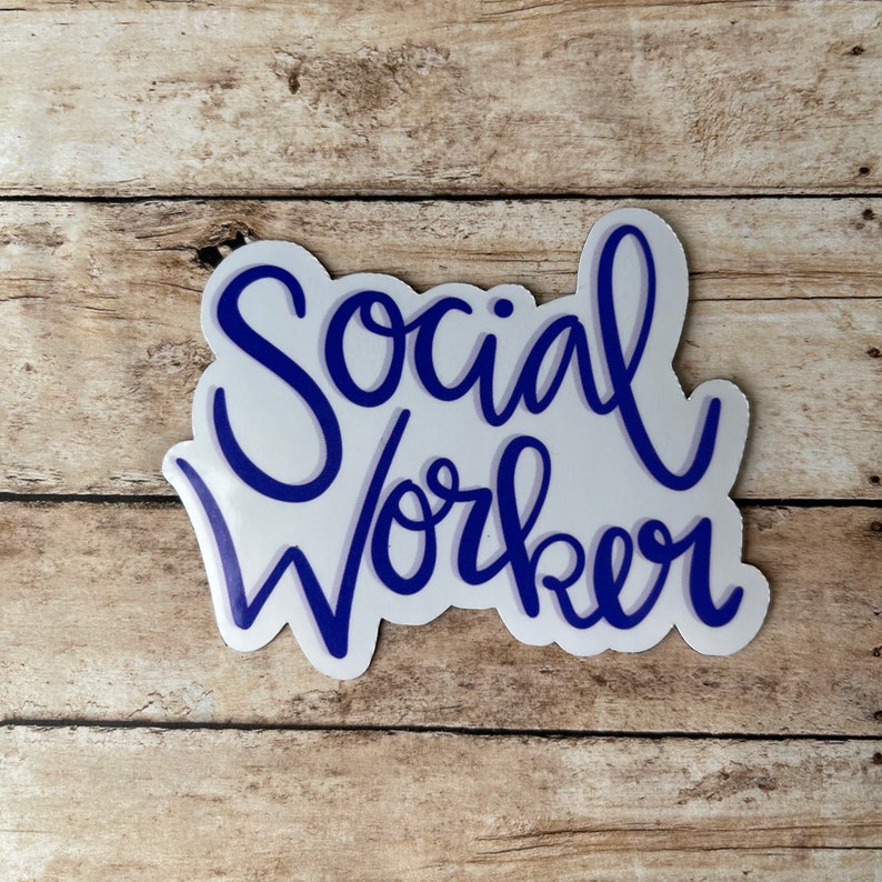 May include: A white sticker with the words "Social Worker" written in blue cursive lettering.