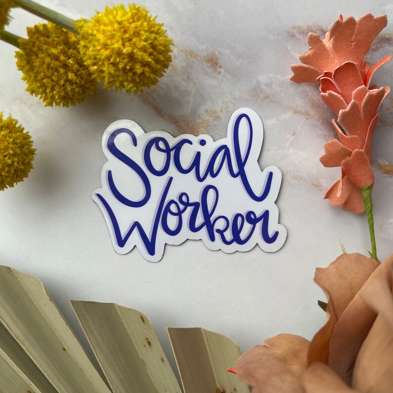 May include: A white sticker with blue lettering that says "Social Worker" on a white background.