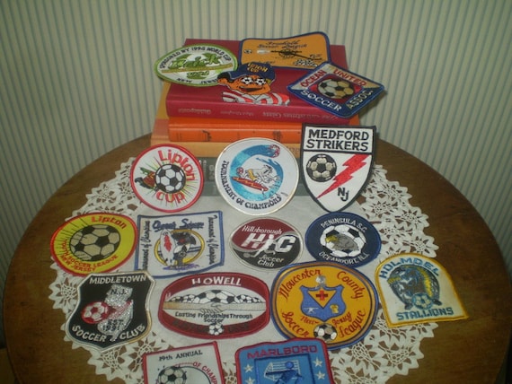 17 new, unused soccer patches- Soccer league and t