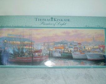 THOMAS KINKAID PUZZLE- New, unopened vintage puzzle by Thomas Kinkaid- Fisherman's Wharf at twilight- 700 pc puzzle ages 12+- panoramic