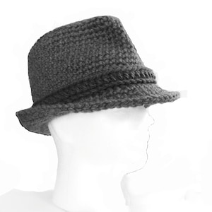 May include: A gray crocheted fedora hat with a wide brim.