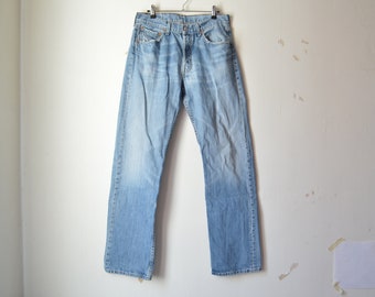 vintage 90s Levi&#39;s 501 faded blue button fly high waist straight leg boyfriend denim jeans // W32