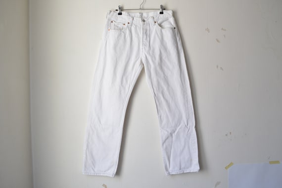 white Levi's 501 high waist straight leg buttony f