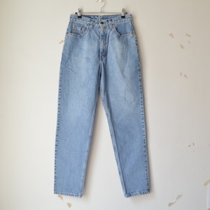 Vintage 1980s Levi&#39;s 881 high waist tapered leg orange tab medium wash mom carrot jeans denim // W31
