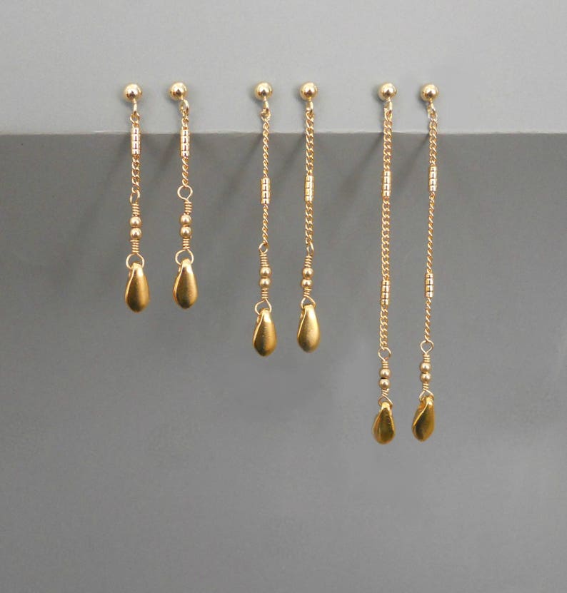 delicate gold earrings