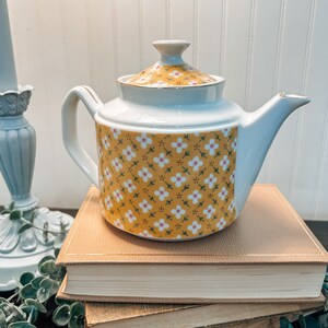 John Wagner and Sons yellow and white floral teapot with. gold accents made in Japan