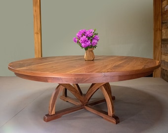 Handcrafted Round Walnut Table with Curved Pedestal Legs