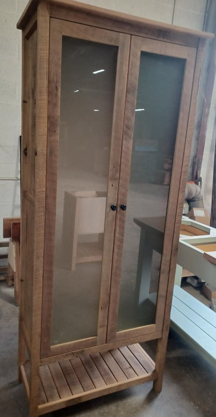 Wood linen cabinet with glass doors deals