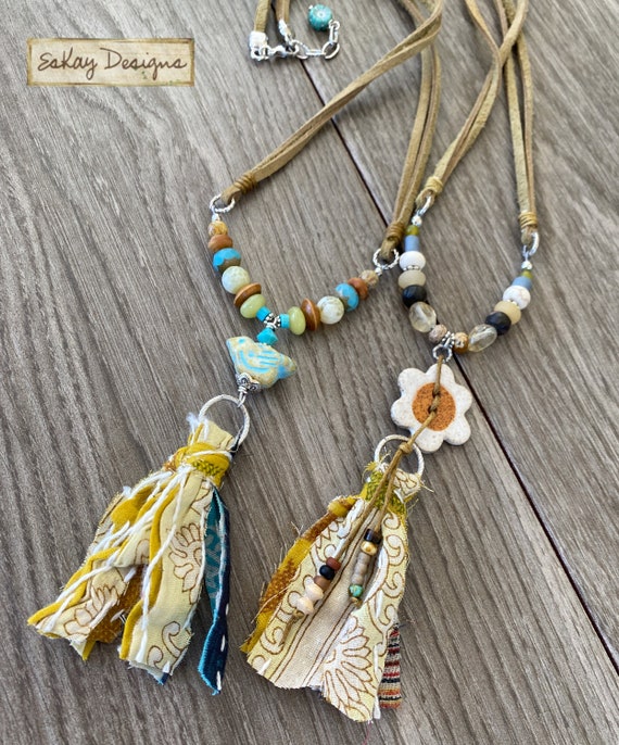 Beaded necklace with fabric best sale tassel
