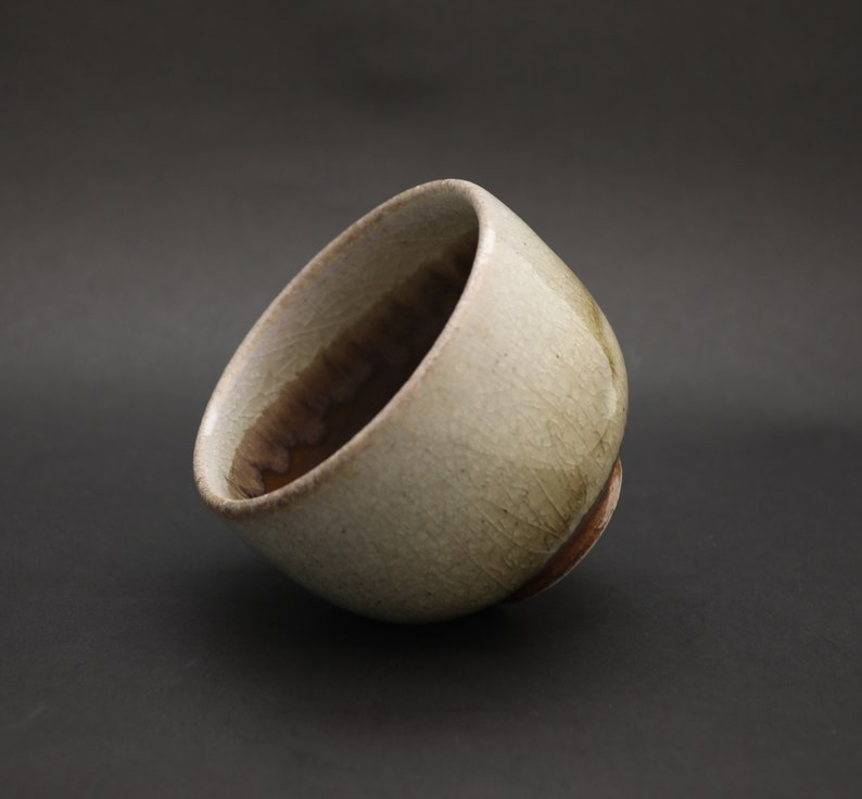 White Stoneware Tea Cup with Shino Glaze