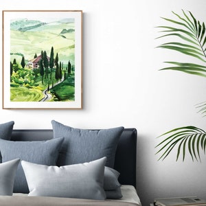 May include: A watercolor painting of a green landscape with a winding road leading to a small house. The house is surrounded by trees and the hills are rolling in the background.