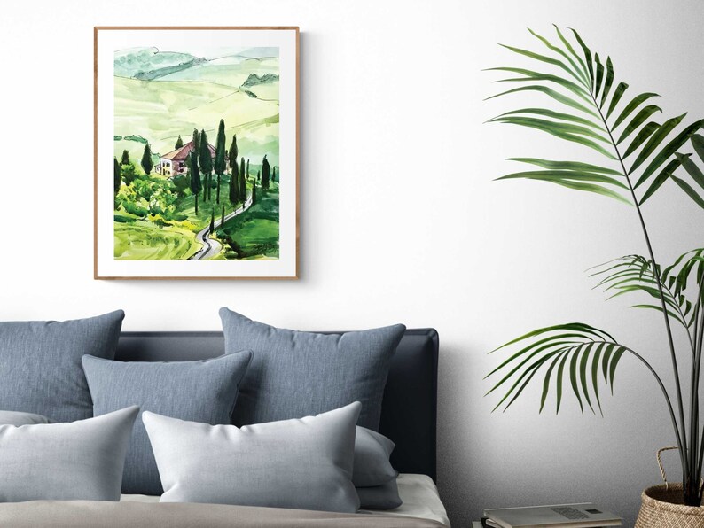 May include: A watercolor painting of a green landscape with a winding road leading to a small house. The house is surrounded by trees and the hills are rolling in the background.