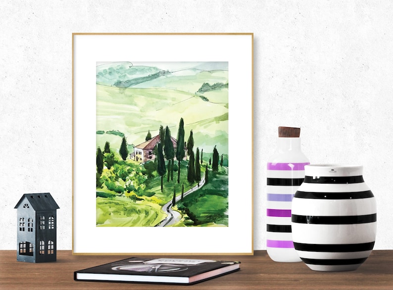 May include: A watercolor painting of a house in a green, rolling landscape. The house is white with a red roof and is surrounded by trees. A winding road leads up to the house.