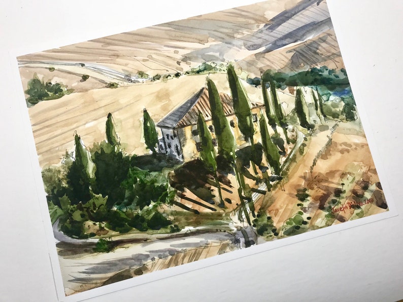 May include: Watercolor painting of a house with a terracotta roof and a row of cypress trees in front of it. The house is set against a backdrop of rolling hills and a blue sky.