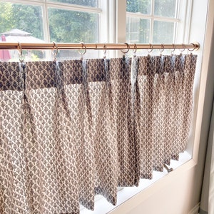 This fresh black block print on brown back ground. Perfect neutral pallet Pleated cafe curtain summer.
