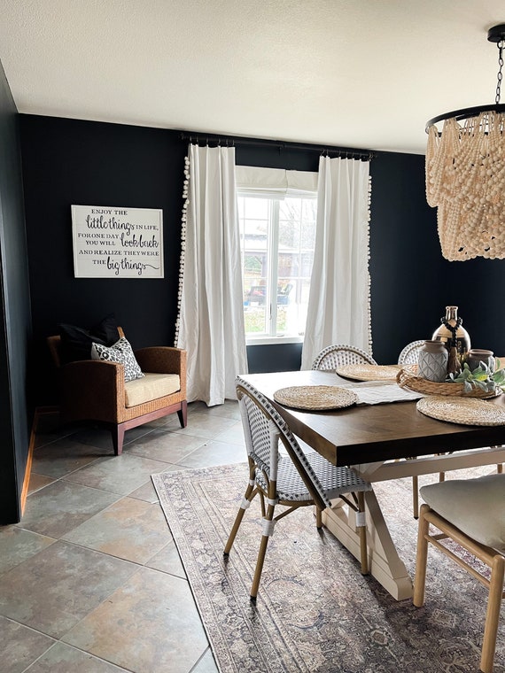 In a black room with white curtains discount
