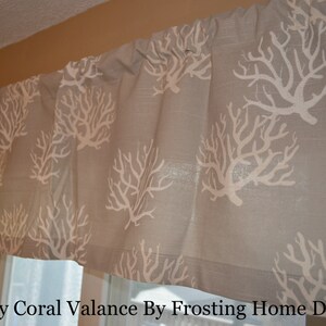 May include: Gray valance with a white coral pattern. The fabric is a light gray color. The text at the bottom of the image reads "Gray Coral Valance By Frosting Home Decor."