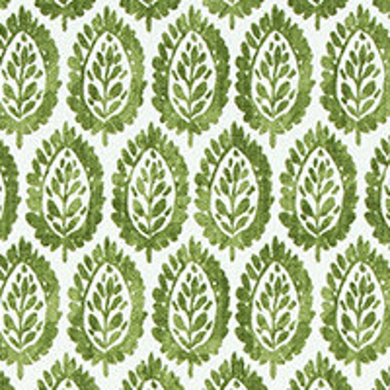 May include: A repeating pattern of green leaf-shaped designs on a white background. The leaves have a watercolor-like texture and are arranged in a symmetrical pattern.