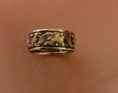 Antique sterling floral band ring H Wexel