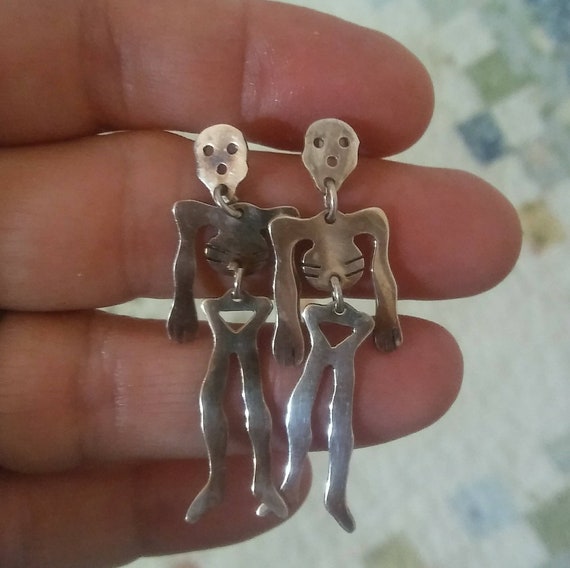 Long sterling jointed skeleton earrings