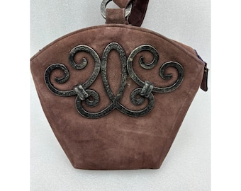 Bolso bandolera vintage Paloma Picasso de piel italiana con detalles metálicos marrones.