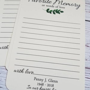 Puede incluir: Una tarjeta blanca con hojas verdes y el texto "Por favor, comparte un recuerdo favorito o palabras de amor." La tarjeta tambi&eacute;n incluye el texto "con amor, Penny J. Glenn 1948-2018 En nuestros corazones para siempre."