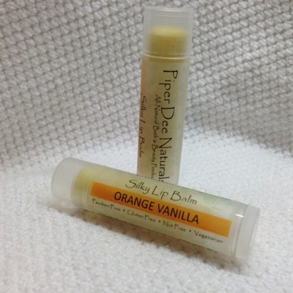 Orange Vanilla all-natural lip balm, Cocoa Butter & Beeswax formula with Jojoba Oil, handmade in small batches.
