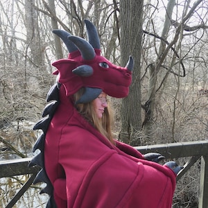 PDF Pattern hooded dragon cloak one size fits all head is a hat legs tie around waist use wing sleeves to move wings or tie over shoulders