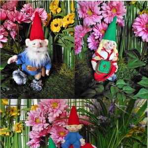 May include: Three handmade felt gnome dolls with different outfits and hats. The gnomes are sitting in a garden setting with green plants and pink flowers.