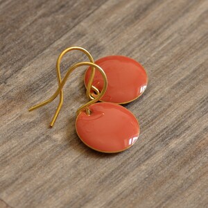 fine small enamel earrings in peach golden