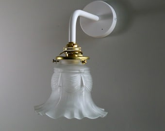 antique french wall mounted sconce light in translucid glass with a moulded antique decor, wall lamp - tulip light