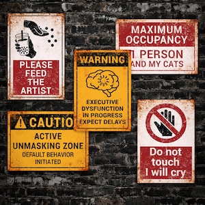 May include: A collection of distressed metal signs with humorous messages. One sign reads "Please Feed The Artist," another says "Maximum Occupancy 1 Person and My Cats." Other signs include "Warning Executive Dysfunction In Progress" and "Do Not Touch I Will Cry."