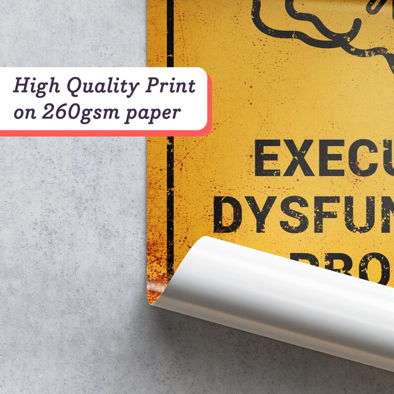 May include: A rolled-up poster with a yellow background and black text. The text reads "EXECU DYSFUN PRO". A white label in the upper left corner states "High Quality Print on 260gsm paper". The poster is partially unrolled, revealing a white edge.