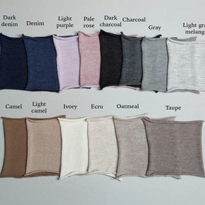 May include: Swatch cards showing different colors of knit fabric. The colors include dark denim, denim, light purple, pale rose, dark charcoal, charcoal, gray, light gray melange, camel, light camel, ivory, ecru, oatmeal, and taupe.