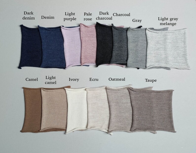 May include: Swatch cards showing different colors of knit fabric. The colors include dark denim, denim, light purple, pale rose, dark charcoal, charcoal, gray, light gray melange, camel, light camel, ivory, ecru, oatmeal, and taupe.