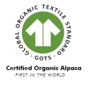 May include: Green circle with the text "Global Organic Textile Standard GOTS" around the edge. Inside the circle is a white silhouette of two t-shirts. Below the circle is the text "Certified Organic Alpaca First in the World."