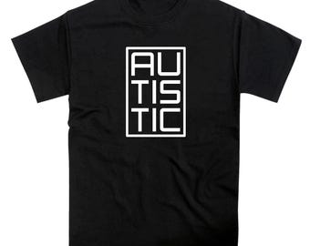 May include: Black t-shirt with white text that reads "AUTISTIC" in a box.