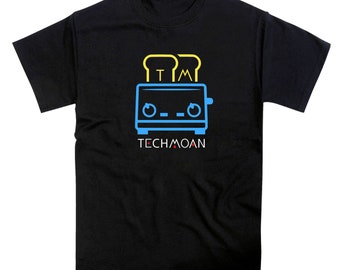 May include: Black t-shirt with a blue and yellow illustration of a toaster with bread popping up. The text "TECHMOAN" is below the toaster.