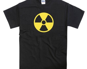 May include: Black t-shirt with a yellow radiation symbol graphic.