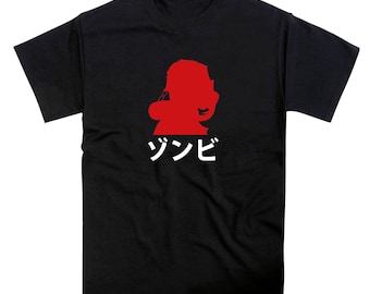 May include: Black t-shirt with a red silhouette of a person and the Japanese word "シンビ" in white text.