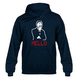 May include: A navy blue hoodie featuring a white pixelated image of a person thinking and the word "HELLO" in red.