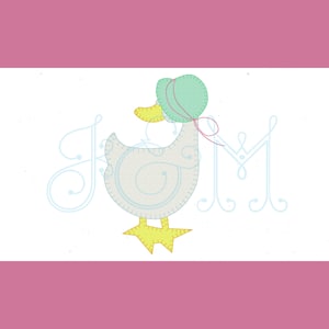 May include: A light blue duck with a green and pink hat and yellow feet. The duck is standing on a white background with the letters "J" and "M" in blue cursive.