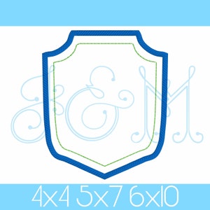 May include: A blue and green embroidered shield with the text "4x4 5x7 6x10" at the bottom.