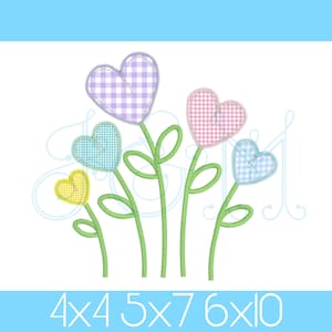 May include: Five embroidered heart-shaped flowers with gingham patterns in purple, pink, blue, and yellow. The flowers have green stems and leaves.