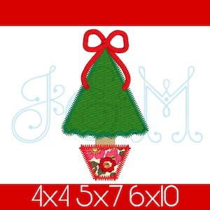 May include: A green Christmas tree with a red bow and a floral pot. The tree is 4 inches tall, 5 inches wide, 7 inches tall, 6 inches wide, and 10 inches tall.