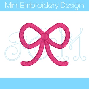 Puede incluir: Un diseño de lazo bordado de color rosa. Este diseño es perfecto para añadir un toque de fantasía a cualquier proyecto.