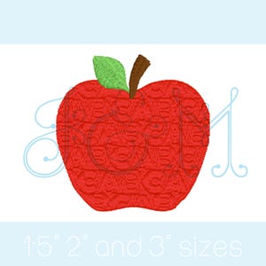 May include: An embroidered red apple design with a green leaf and brown stem. The apple features a textured, repeating pattern across its surface. The text "1.5" 2" and 3" sizes" is printed at the bottom in a light blue font colour.